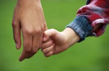child_holding_hand.jpg